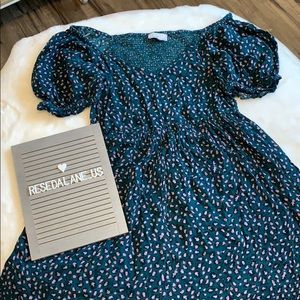 Patrons of Peace Smocked Dress